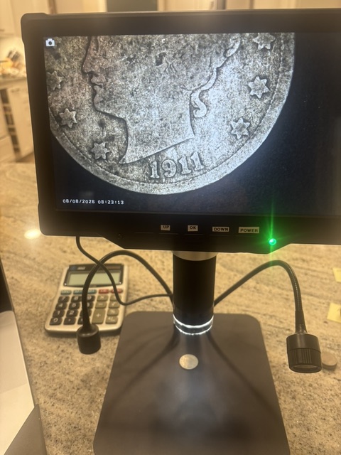 Old coins Tom has purchased from local customers